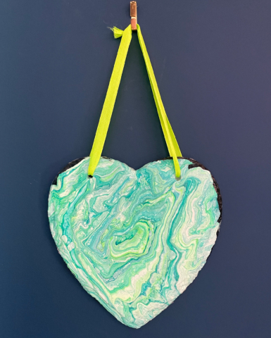 Fluid art in sea greens on slate heart